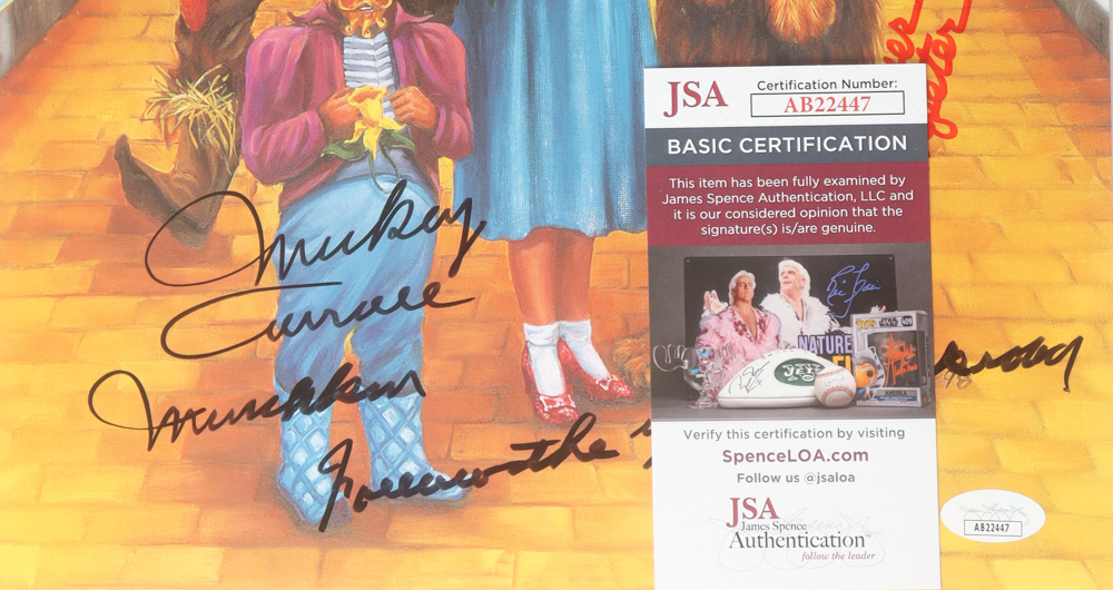 Jerry Maren, Mickey Carroll & Karl Slover Signed "The Wizard of Oz" 11.5x14.5 Print with Multiple Inscriptions (JSA) at PristineAuction.com Jerry Maren, Mickey Carroll & Karl Slover Signed "The Wizard of Oz" 11.5x14.5 Print with Multiple Inscriptions (JSA) at PristineAuction.com