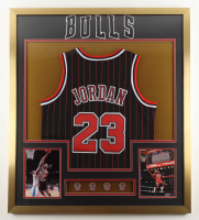 Michael Jordan Custom Framed Jersey Display With (4) Bulls Finals Pins & (2) Bulls Logo Patches at PristineAuction.com