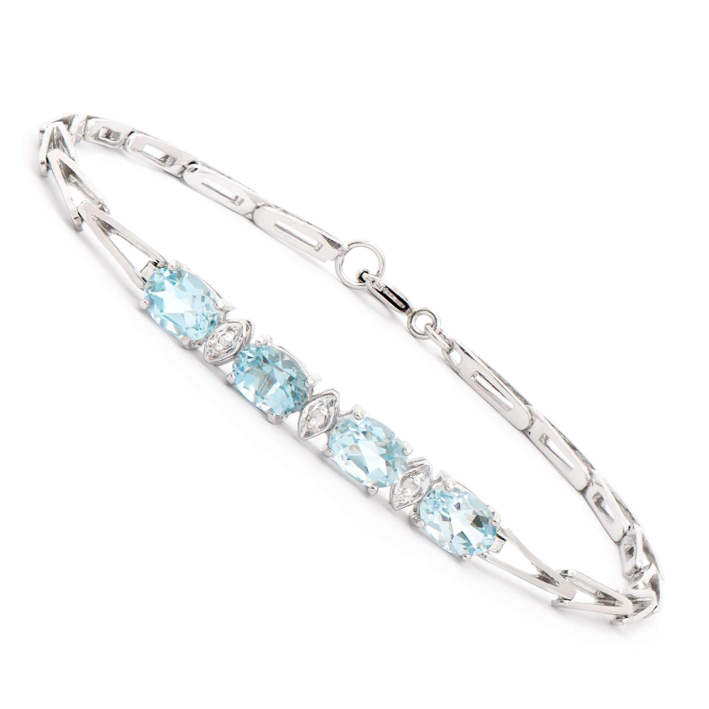 2.83 CTW Natural Blue Topaz & Diamonds Rhodium Plated Designer Bracelet 7.5" | Estimated Retail Value: $1,749 (AMG) at PristineAuction.com