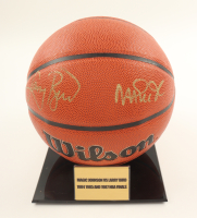 Larry Bird & Magic Johnson Signed NBA Basketball With Display Stand (PSA & Beckett) at PristineAuction.com