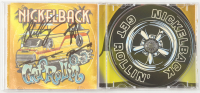 Nickelback "Get Rollin'" CD Insert Signed By (4) with Chad Kroeger, Ryan Peake, Mike Kroeger & Daniel Adair (JSA) at PristineAuction.com
