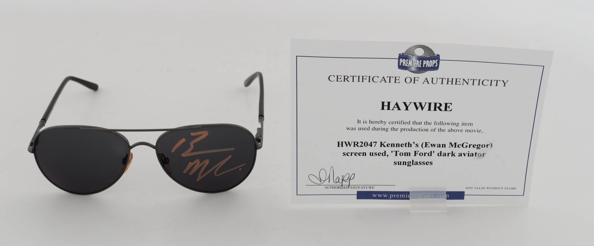 Ewan McGregor Signed On-Screen Worn "Haywire" Tom Ford Aviator Sunglasses (Beckett & Premiere Props) at PristineAuction.com Ewan McGregor Signed On-Screen Worn "Haywire" Tom Ford Aviator Sunglasses (Beckett & Premiere Props) at PristineAuction.com