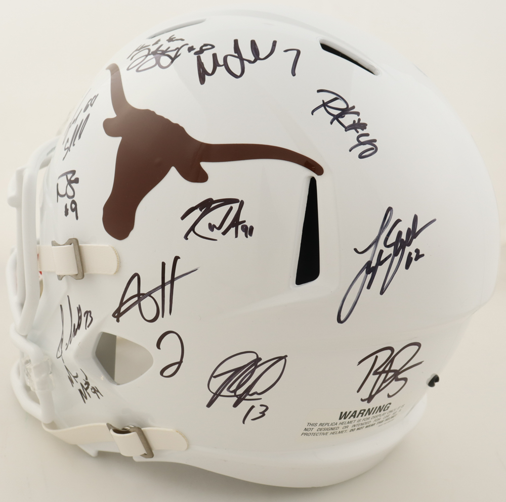 Vince Young, Michael Griffin, Limas Sweed, Aaron Harris, Jordan Shipley | 2005 National Champions Texas Longhorns Full-Size Authentic On-Field Speed Helmet Signed by (24) (AIV) at PristineAuction.com Vince Young, Michael Griffin, Limas Sweed, Aaron Harris, Jordan Shipley | 2005 National Champions Texas Longhorns Full-Size Authentic On-Field Speed Helmet Signed by (24) (AIV) at PristineAuction.com