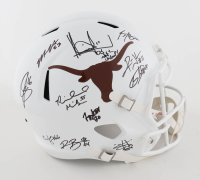 Texas Longhorns Full-Size Speed Helmet Signed by (24) with Vince Young, Romonce Taylor, Michael Griffin, Jermichael Finley with Multiple Career Stat Inscriptions (AIV) at PristineAuction.com