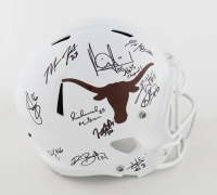 Texas Longhorns Full-Size Speed Helmet Signed by (24) with Vince Young, Romonce Taylor, Michael Griffin, Jermichael Finley with Multiple Career Stat Inscriptions (AIV) at PristineAuction.com