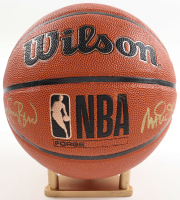 Larry Bird & Magic Johnson Signed NBA Basketball With Display Stand (PSA & Beckett) at PristineAuction.com