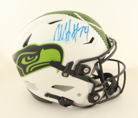 Marshawn Lynch Signed Seahawks Full-Size Authentic On-Field Lunar Eclipse Alternate Speedflex Helmet (Fanatics) at PristineAuction.com