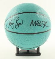 Larry Bird & Magic Johnson Signed Tiffany & Co. x Spalding Basketball with All Wood Stand (Beckett & PSA) at PristineAuction.com