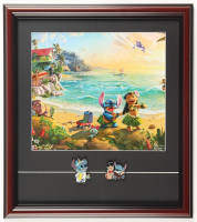 Thomas Kinkade Walt Disney's "Lilo & Stitch" Custom Framed Print Display with (2) Official Disney Lilo & Stitch Pins at PristineAuction.com