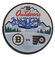 Brad Marchand Signed 2021 NHL Outdoors at Lake Tahose Commemorative Hockey Puck (Marchand) at PristineAuction.com