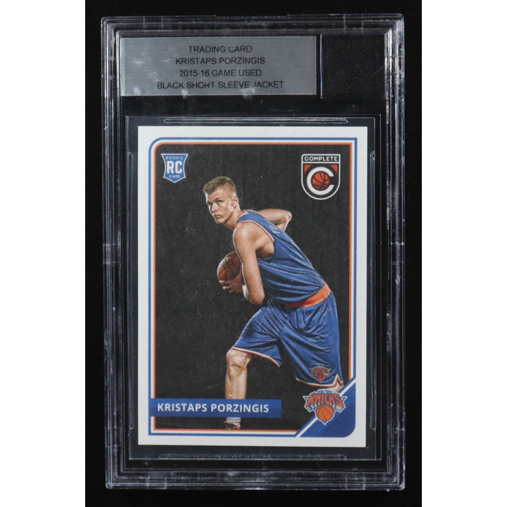 Kristaps Porzingis 2015-16 Panini Complete #319 RC with Rookie Season Game Used Short Sleeve Jacket Piece at PristineAuction.com
