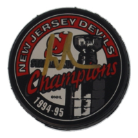Martin Brodeur Signed Devils 1995 Stanley Cup Champions Logo Hockey Puck (JSA) at PristineAuction.com