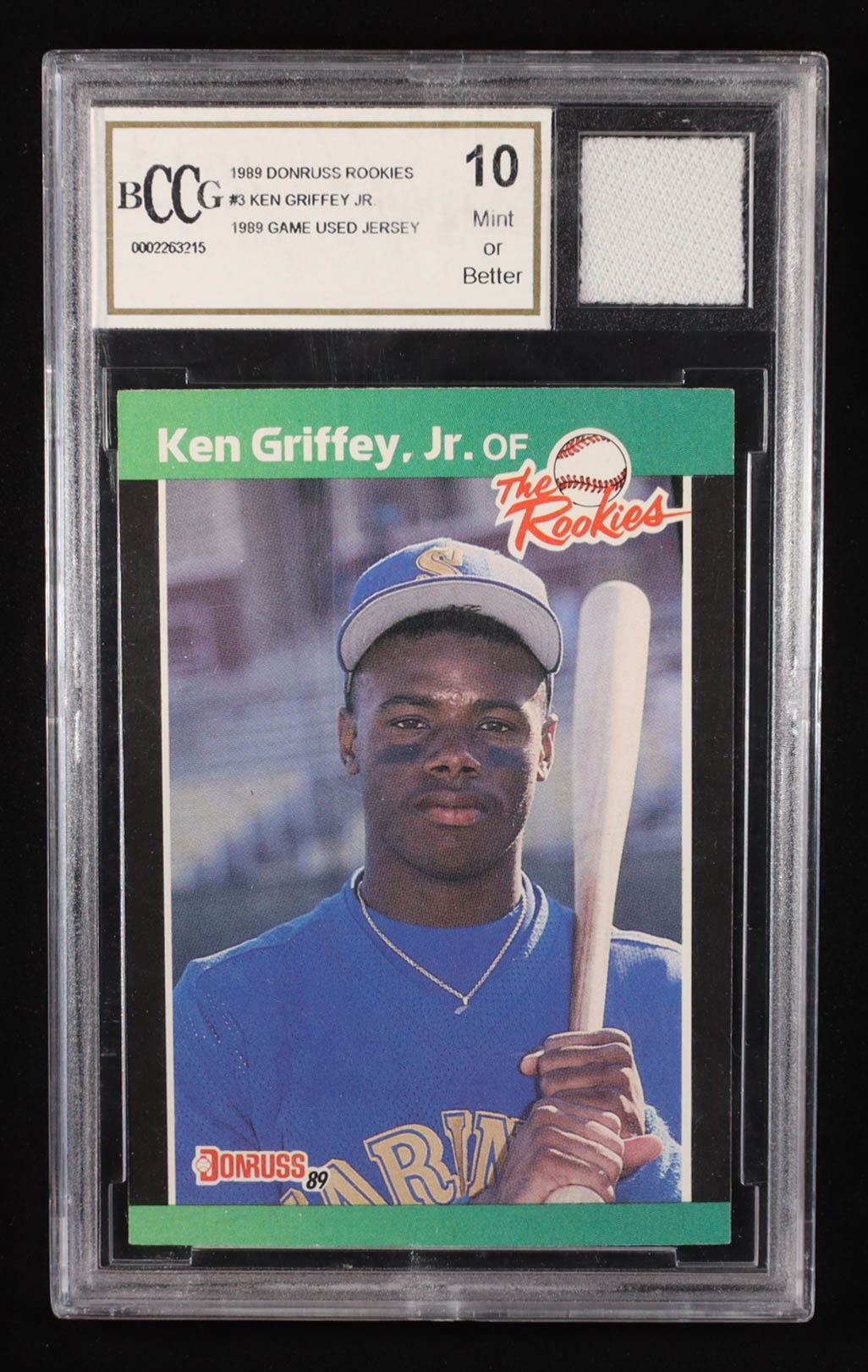 Ken Griffey Jr. 1989 Donruss Rookies #3 RC With '89 Game-Used Jersey Swatch (BCCG 10) at PristineAuction.com Ken Griffey Jr. 1989 Donruss Rookies #3 RC With '89 Game-Used Jersey Swatch (BCCG 10) at PristineAuction.com