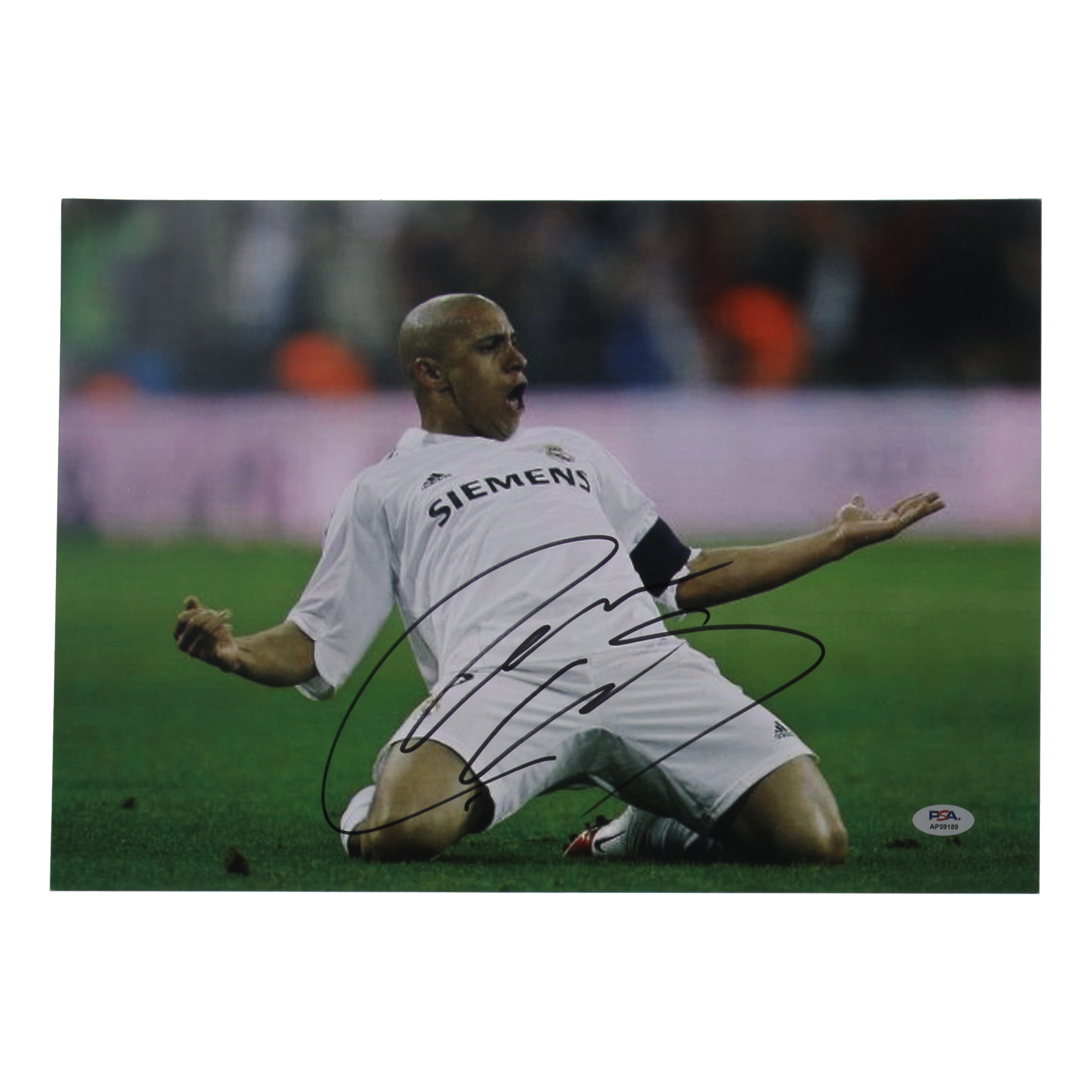 Roberto Carlos Signed 11.25x16.25 Photo (PSA) at PristineAuction.com Roberto Carlos Signed 11.25x16.25 Photo (PSA) at PristineAuction.com