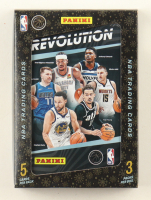 2023-24 Panini Revolutions Basketball Trading Card Tin with (3) Packs at PristineAuction.com