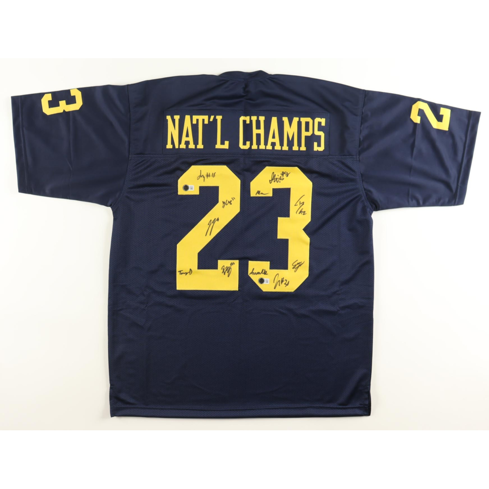 2023 National Champions Team-Signed Jersey By (11) with J.J. McCarthy, Tommy Doman, Greg Crippen, Zeke Berry (Beckett) at PristineAuction.com