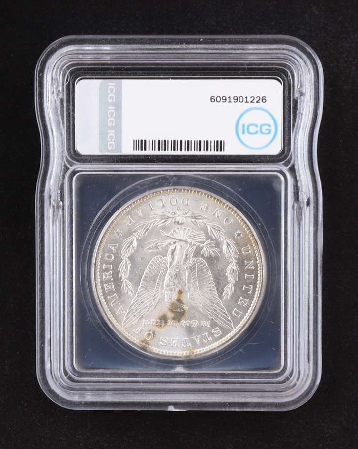 1885-O Morgan Silver Dollar - Austin Hutto Signature Label (ICG MS63) at PristineAuction.com 1885-O Morgan Silver Dollar - Austin Hutto Signature Label (ICG MS63) at PristineAuction.com