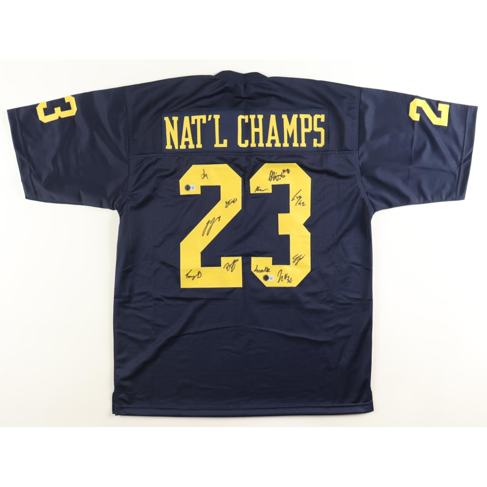 2023 National Champions Team-Signed Jersey By (11) with J.J. McCarthy, Tommy Doman, Greg Crippen, Zeke Berry (Beckett) at PristineAuction.com