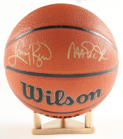 Larry Bird & Magic Johnson Signed NBA Basketball With Display Stand (PSA & Beckett) at PristineAuction.com