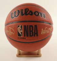 Larry Bird & Magic Johnson Signed NBA Basketball with Display Stand (PSA & Beckett) at PristineAuction.com