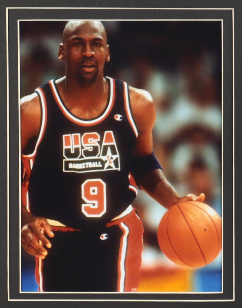 Michael Jordan Custom Framed Jersey Display with (2) Olympic Pins & Vintage USA Cloth Patch at PristineAuction.com Michael Jordan Custom Framed Jersey Display with (2) Olympic Pins & Vintage USA Cloth Patch at PristineAuction.com