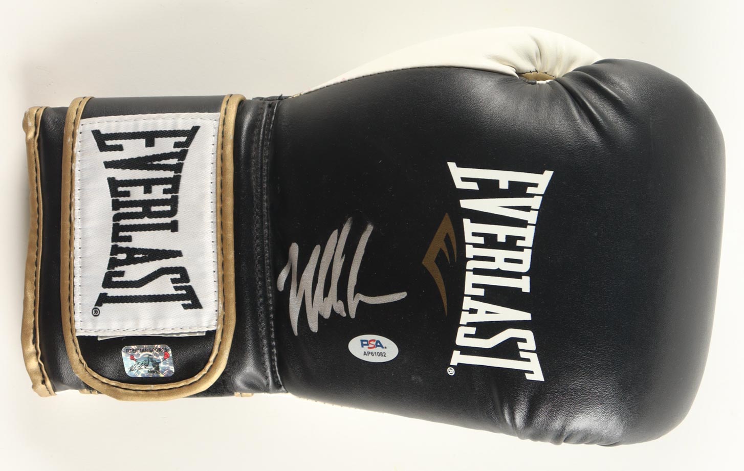 Mike Tyson Signed Everlast Boxing Glove With Display Stand & Name Plaque (PSA & Tyson) at PristineAuction.com Mike Tyson Signed Everlast Boxing Glove With Display Stand & Name Plaque (PSA & Tyson) at PristineAuction.com