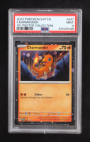 Charmander 2023-24 Pokemon Scarlet and Violet Black Star Promos #047 Cosmos (PSA 9) at PristineAuction.com