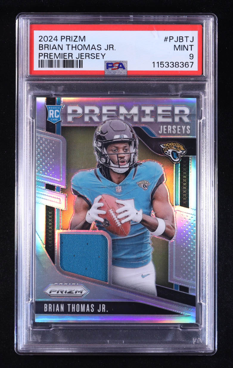 Brian Thomas Jr. 2024 Panini Prizm Premier Jerseys #13 RC (PSA 9) at PristineAuction.com Brian Thomas Jr. 2024 Panini Prizm Premier Jerseys #13 RC (PSA 9) at PristineAuction.com
