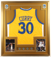 Stephen Curry Signed Custom Framed Jersey Display With (4) LE NBA Champions Pins & (2) Cloth Team Logo Patches (JSA) at PristineAuction.com
