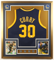 Stephen Curry Signed Custom Framed Jersey Display With (4) LE NBA Champions Pins & (2) Cloth Team Logo Patches (JSA) at PristineAuction.com