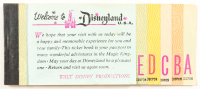 Disneyland Vintage A-E Ticket Book with (8) Attached Tickets at PristineAuction.com