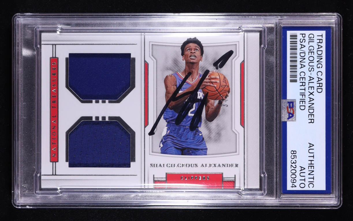 Shai Gilgeous-Alexander Signed 2018-19 Panini National Treasures Rookie Dual Materials #14 RC #34/99 (PSA Authentic) at PristineAuction.com Shai Gilgeous-Alexander Signed 2018-19 Panini National Treasures Rookie Dual Materials #14 RC #34/99 (PSA Authentic) at PristineAuction.com