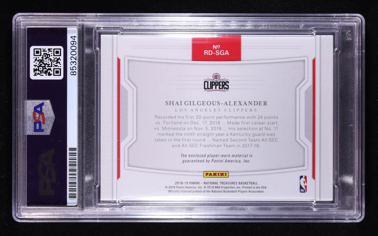 Shai Gilgeous-Alexander Signed 2018-19 Panini National Treasures Rookie Dual Materials #14 RC #34/99 (PSA Authentic) at PristineAuction.com Shai Gilgeous-Alexander Signed 2018-19 Panini National Treasures Rookie Dual Materials #14 RC #34/99 (PSA Authentic) at PristineAuction.com