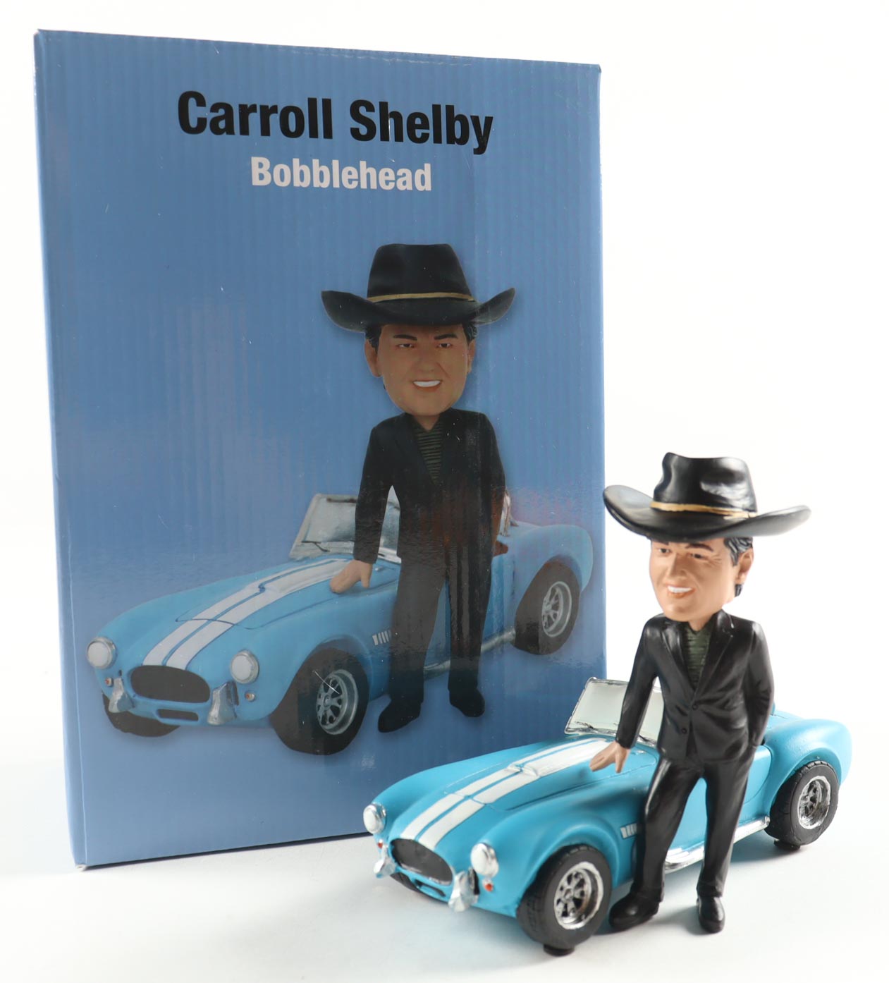 Carroll Shelby with Car 7" Vintage Ceramic Bobblehead at PristineAuction.com Carroll Shelby with Car 7" Vintage Ceramic Bobblehead at PristineAuction.com
