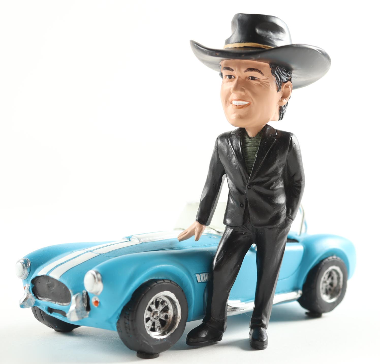 Carroll Shelby with Car 7" Vintage Ceramic Bobblehead at PristineAuction.com Carroll Shelby with Car 7" Vintage Ceramic Bobblehead at PristineAuction.com