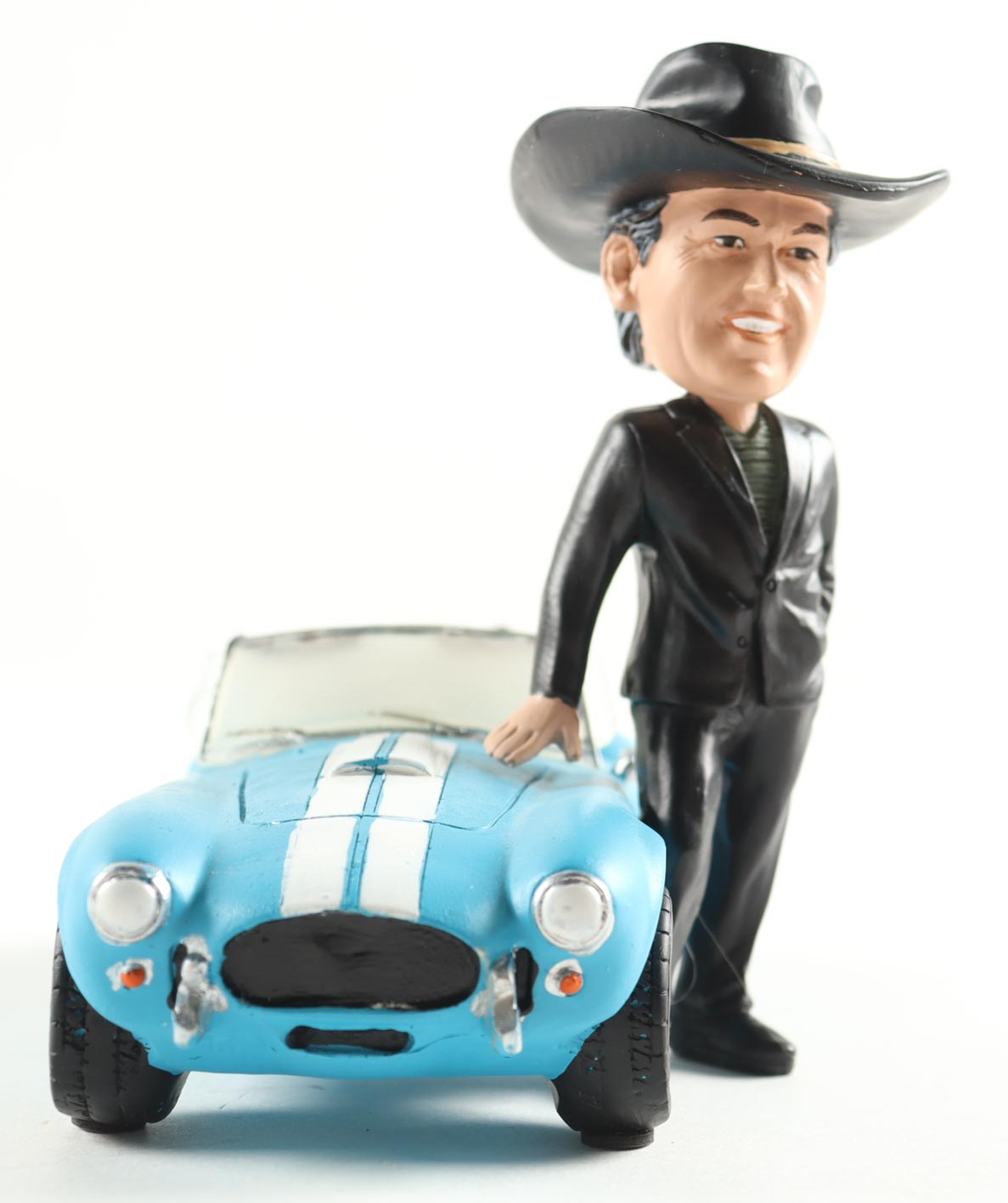 Carroll Shelby with Car 7" Vintage Ceramic Bobblehead at PristineAuction.com Carroll Shelby with Car 7" Vintage Ceramic Bobblehead at PristineAuction.com