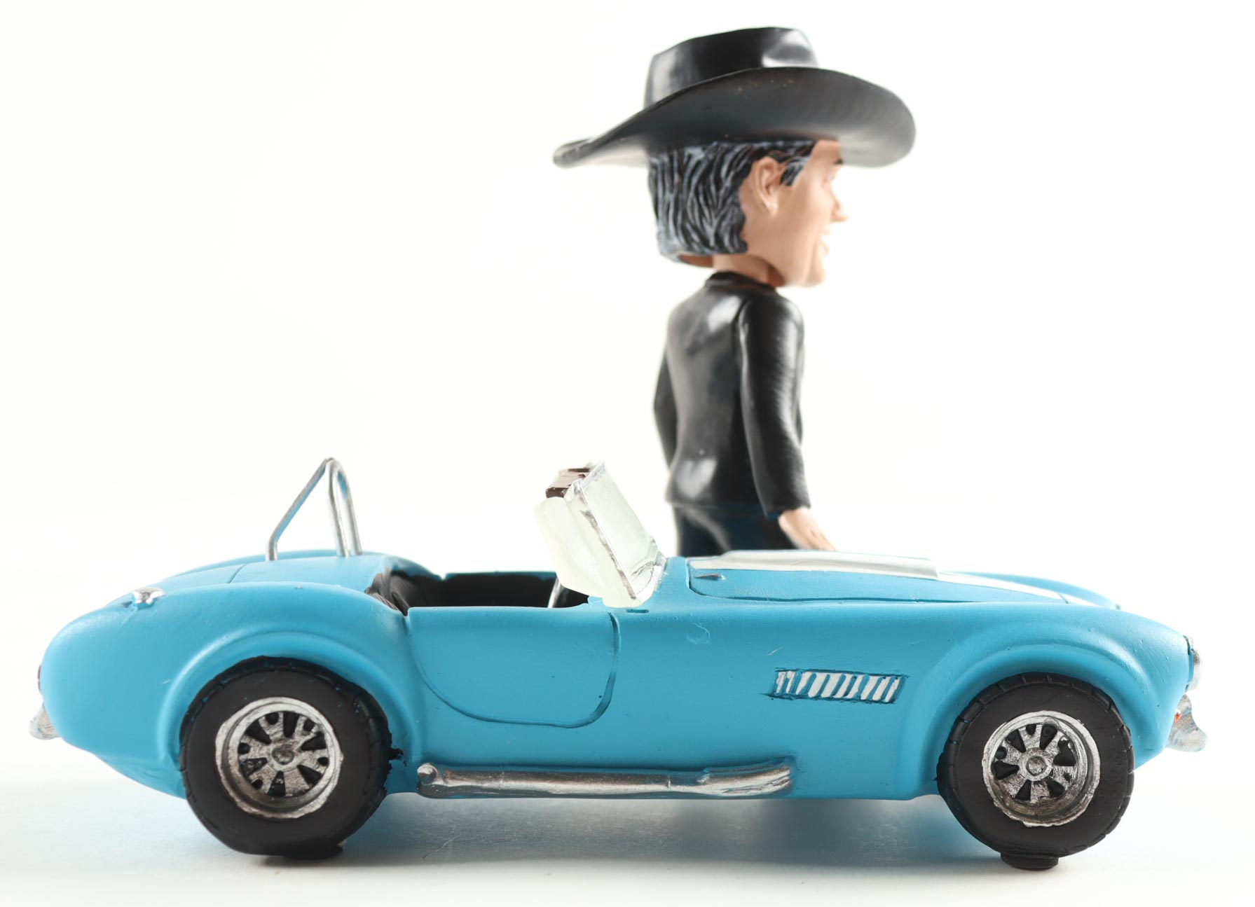 Carroll Shelby with Car 7" Vintage Ceramic Bobblehead at PristineAuction.com Carroll Shelby with Car 7" Vintage Ceramic Bobblehead at PristineAuction.com