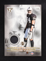 Jason Sehorn / Charles Woodson 2001 Titanium Double Sided Jerseys Patches #108 at PristineAuction.com