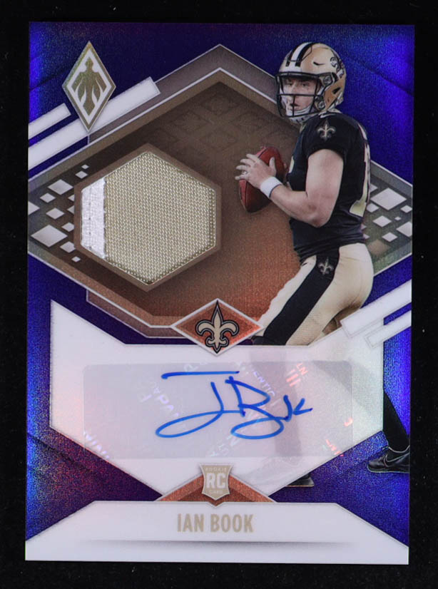 Ian Book 2021 Panini Phoenix Rookie Photo Shoot Purple Patch #RJAIBO #35/50 RC at PristineAuction.com Ian Book 2021 Panini Phoenix Rookie Photo Shoot Purple Patch #RJAIBO #35/50 RC at PristineAuction.com