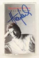 Huey Lewis Signed Huey Lewis and the News "Small World" Cassette Tape Album (Beckett) at PristineAuction.com
