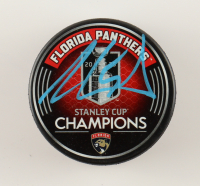 Aaron Ekblad Signed Panthers 2024 Stanley Cup Champions Logo Hockey Puck (Beckett) at PristineAuction.com
