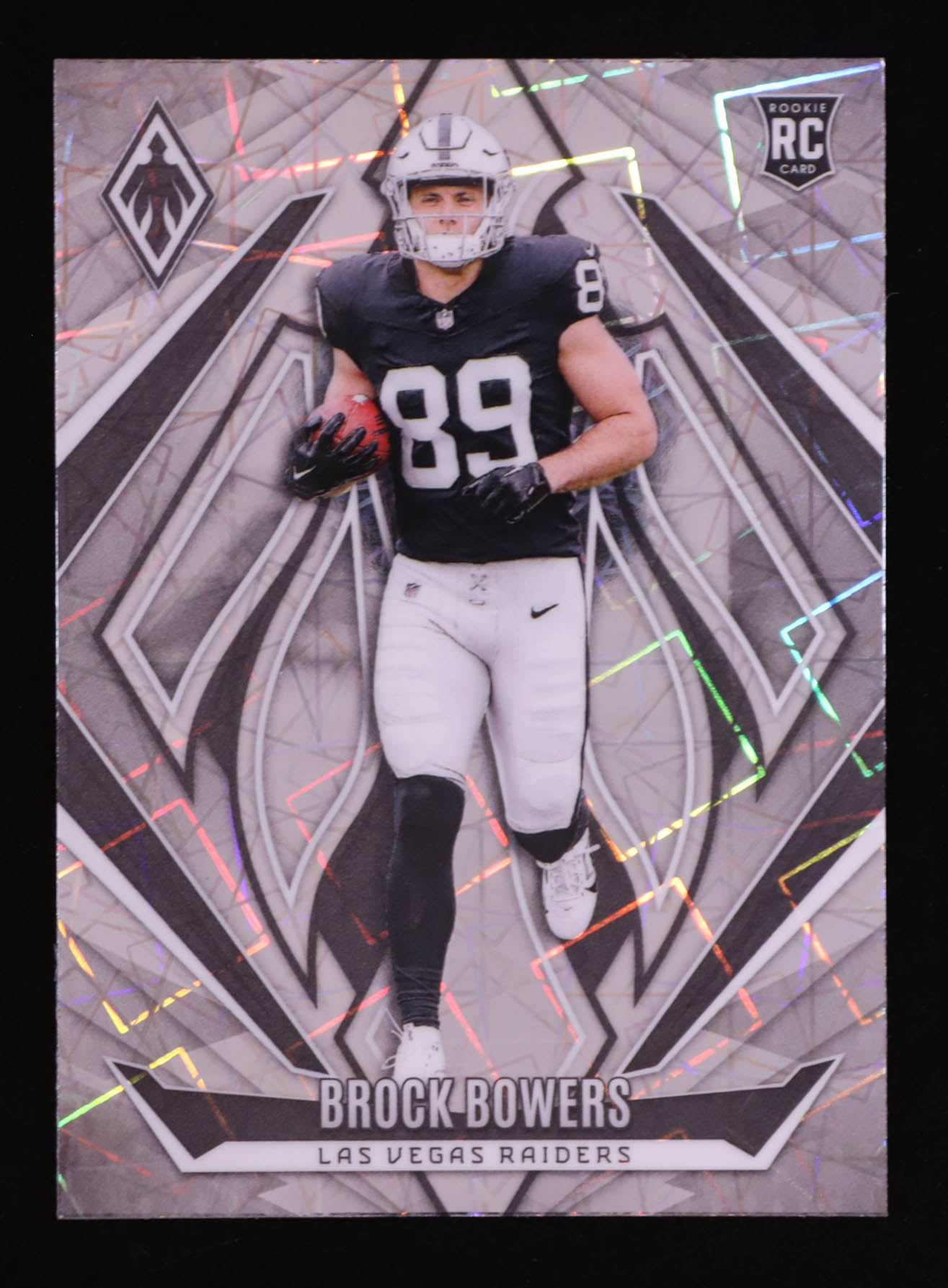 Brock Bowers 2024 Panini Phoenix Lazer #165 RC at PristineAuction.com Brock Bowers 2024 Panini Phoenix Lazer #165 RC at PristineAuction.com