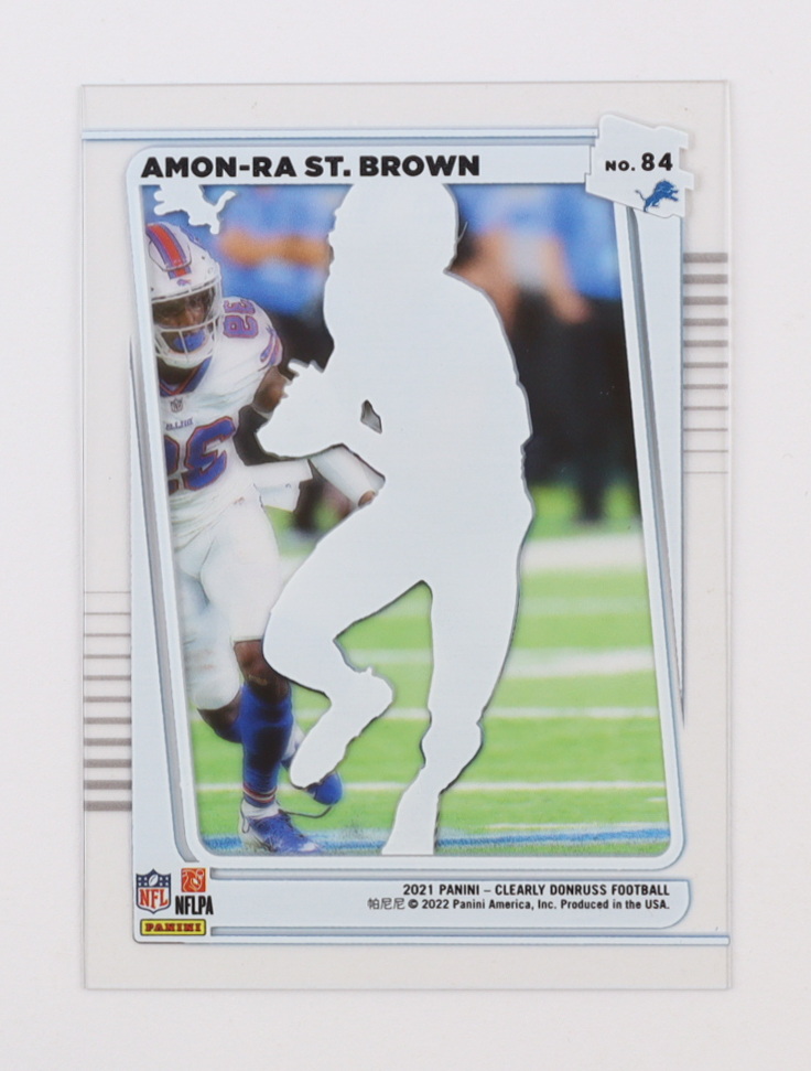 Amon-Ra St. Brown 2021 Clearly Donruss Rated Rookie #84 RC at PristineAuction.com Amon-Ra St. Brown 2021 Clearly Donruss Rated Rookie #84 RC at PristineAuction.com