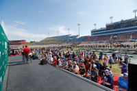 EXCLUSIVE Phoenix Raceway Experience for 2 Garage & Pit Passes, Driver Meeting, Victory Lane Photo with Cup Winner at PristineAuction.com