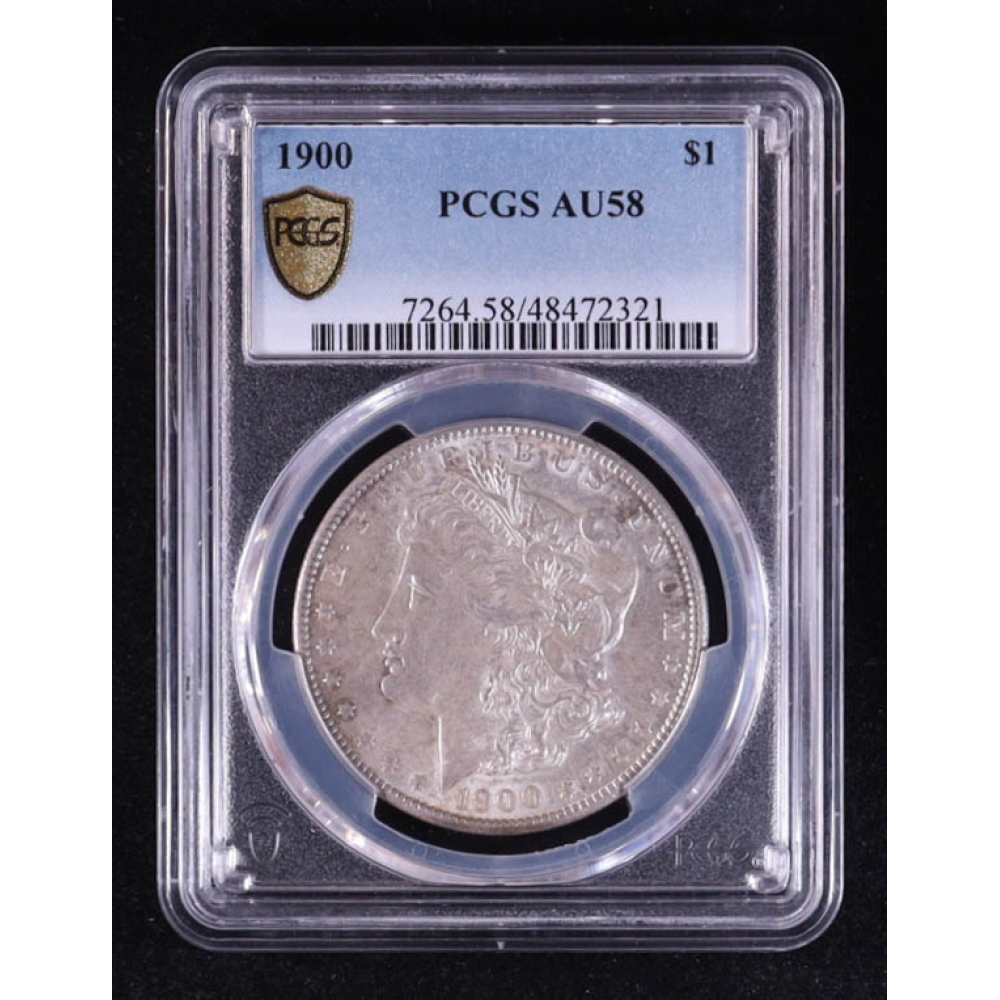 1900 Morgan Silver Dollar - Gold Shield (PCGS AU58) at PristineAuction.com