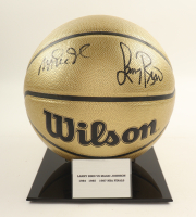 Larry Bird & Magic Johnson Signed NBA Basketball With Display Stand (PSA & Beckett) at PristineAuction.com