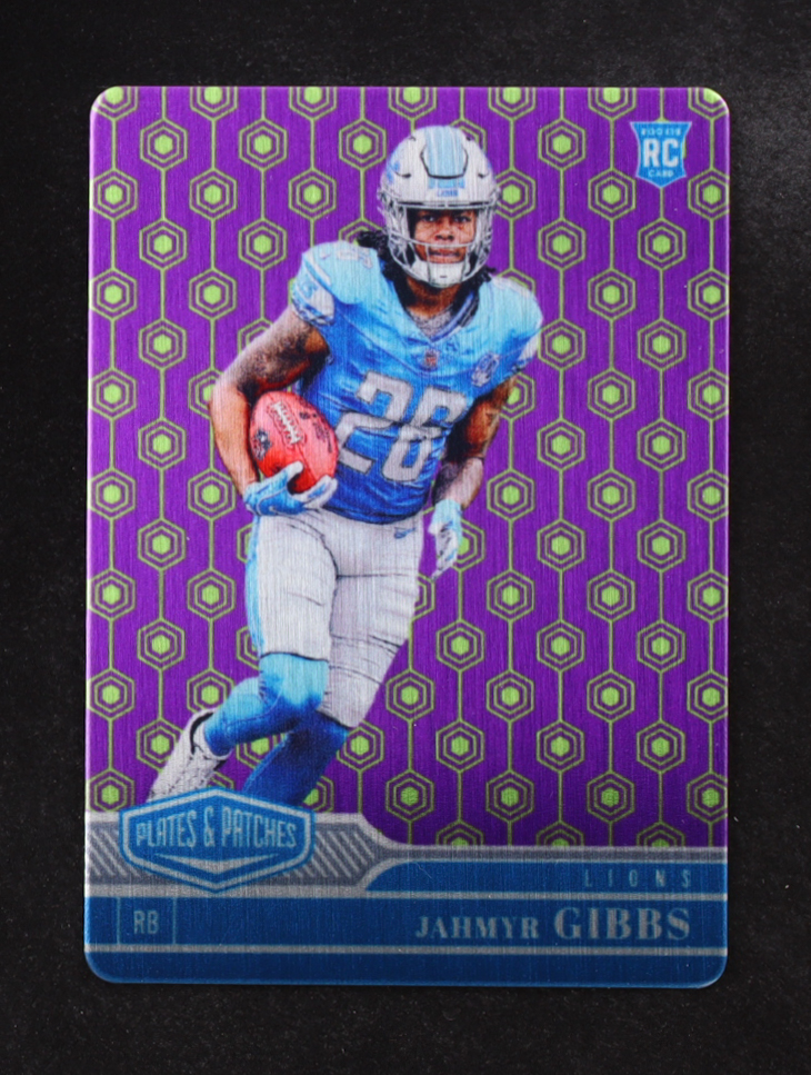 Jahmyr Gibbs 2023 Panini Plates and Patches Metal Vector #164 RC #35/35 at PristineAuction.com Jahmyr Gibbs 2023 Panini Plates and Patches Metal Vector #164 RC #35/35 at PristineAuction.com