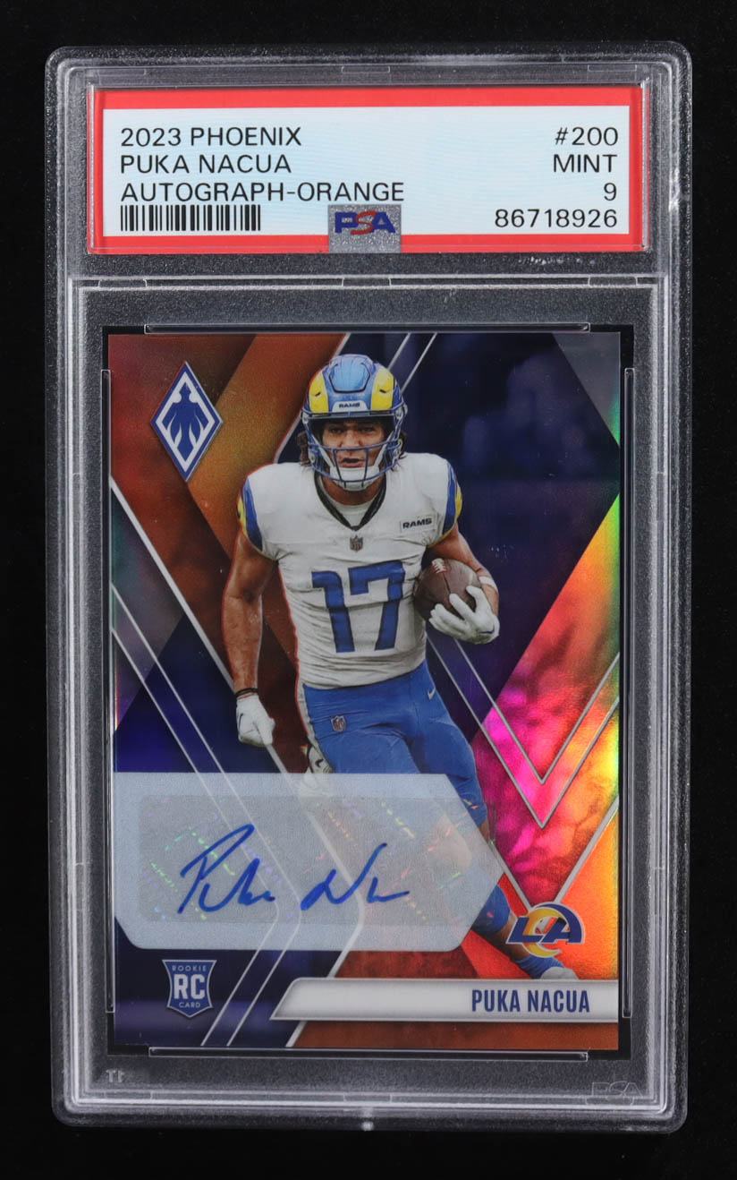 Puka Nacua 2023 Panini Phoenix Rookie Autographs Orange #200 #46/50 RC (PSA 9) at PristineAuction.com Puka Nacua 2023 Panini Phoenix Rookie Autographs Orange #200 #46/50 RC (PSA 9) at PristineAuction.com