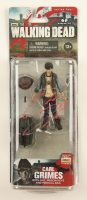 Chandler Riggs Signed "The Walking Dead" Carl Grimes Series 4 McFarlane Action Figure (JSA) at PristineAuction.com