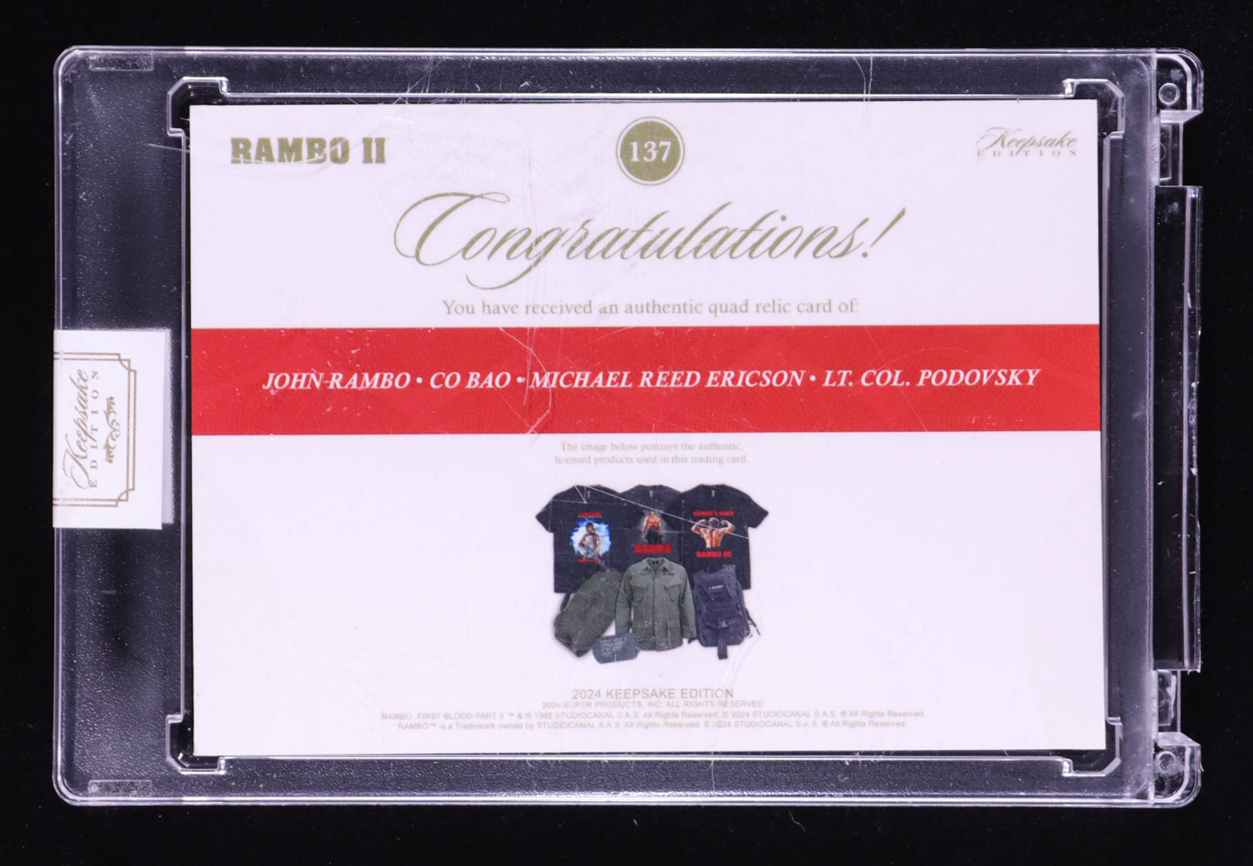 John Rambo/Sam Trautman/Michael Reed Ericson/Lt. Col. Podovsky 2024 Keepsake Edition Quad Relic Authentic Rambo First Blood Part II #137 #36/50 at PristineAuction.com John Rambo/Sam Trautman/Michael Reed Ericson/Lt. Col. Podovsky 2024 Keepsake Edition Quad Relic Authentic Rambo First Blood Part II #137 #36/50 at PristineAuction.com